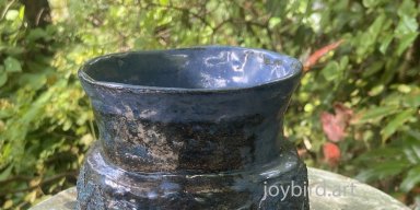 small blue vase with birds