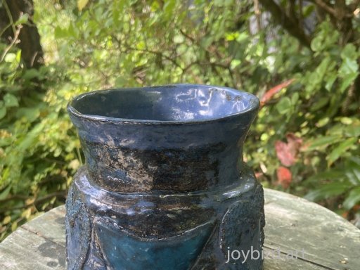 small blue vase with birds
