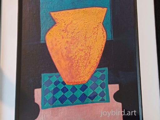 Orange Vase on Checkered Rug